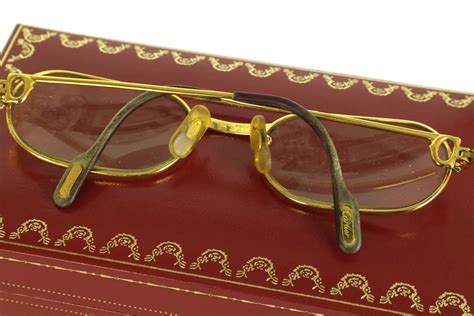 old gold eyeglass frames.